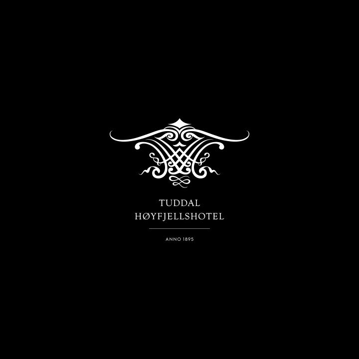Bilde av Tuddal hoyfjellshotell logo på svart bakgrunn