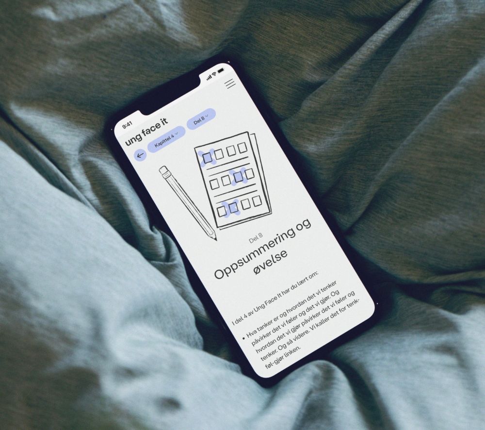 Illustrasjonsbilde av mobil med skjermbilde fra nettsiden til Ung face it